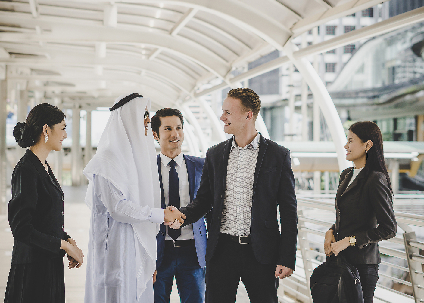 Executives greeting each other at a business venue