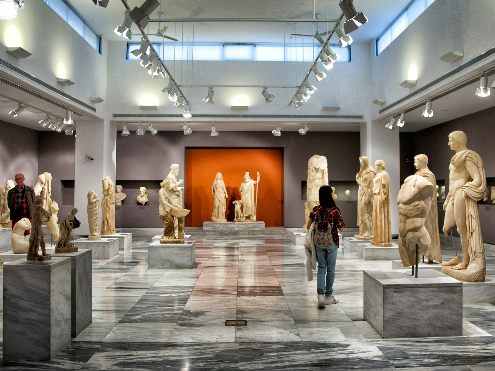 Visitors exploring a museum gallery