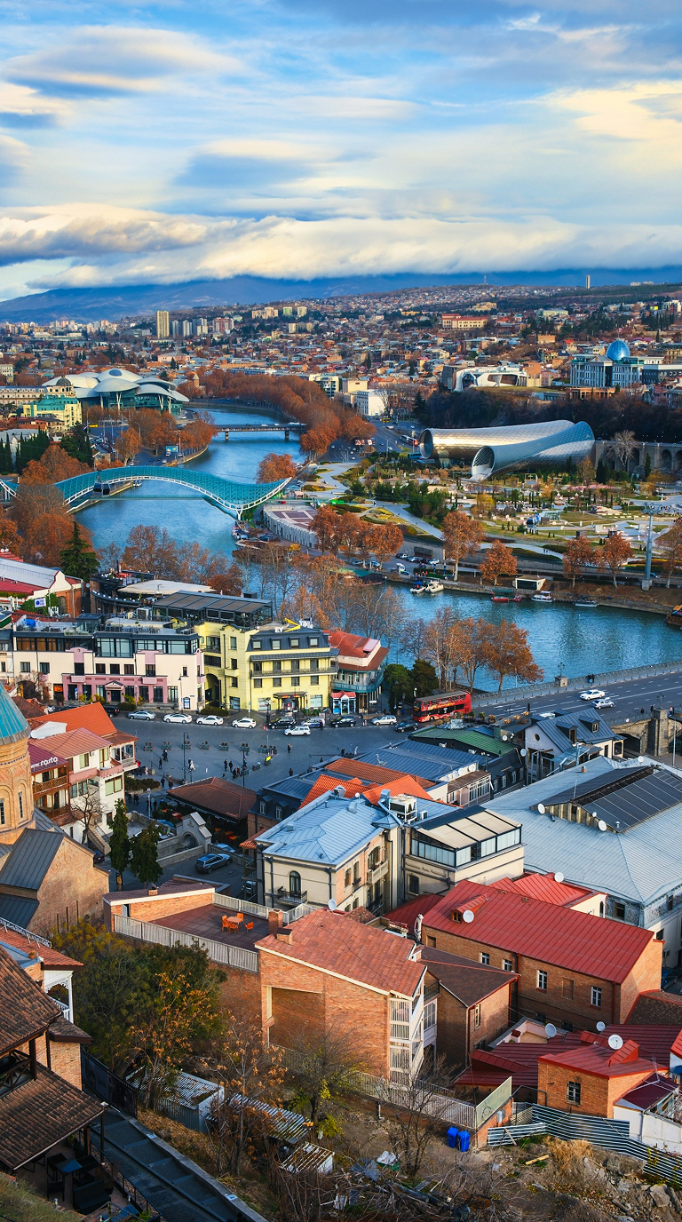 Historic rooftops and riverside views in Tbilisi