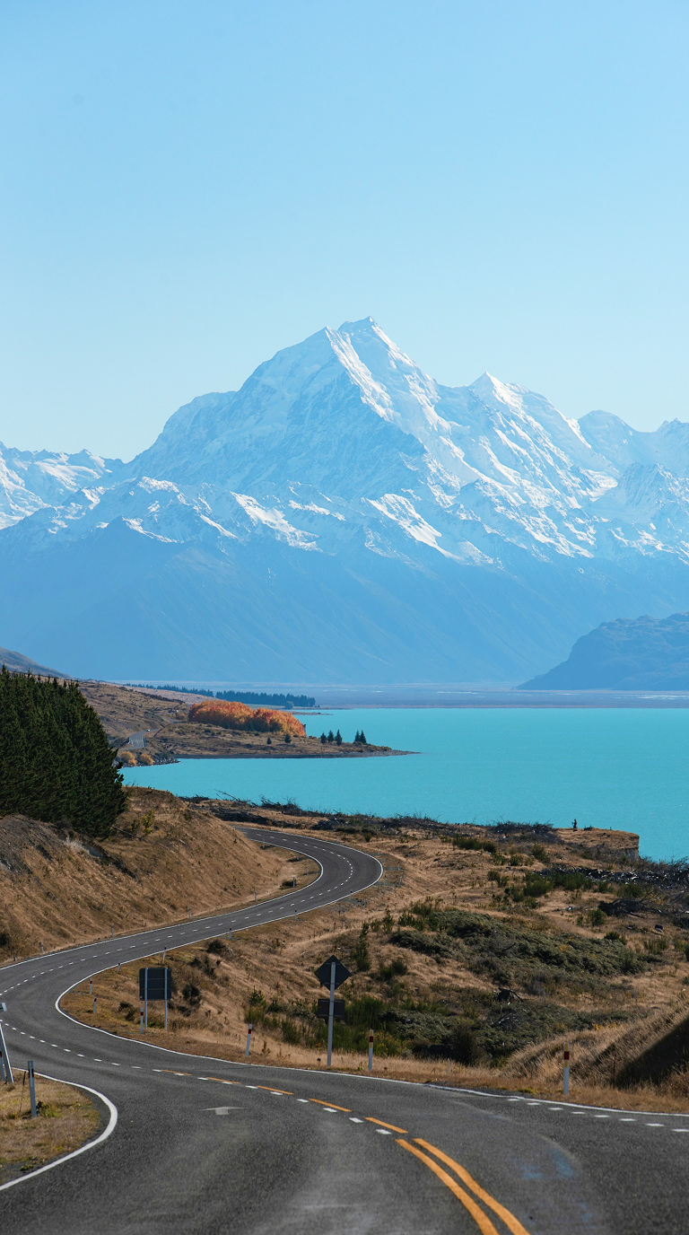 Mountain lake and scenic road in New Zealand