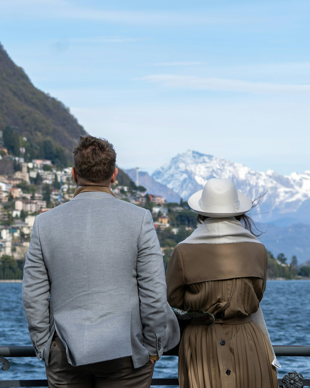 Couple admiring a coastal mountain view