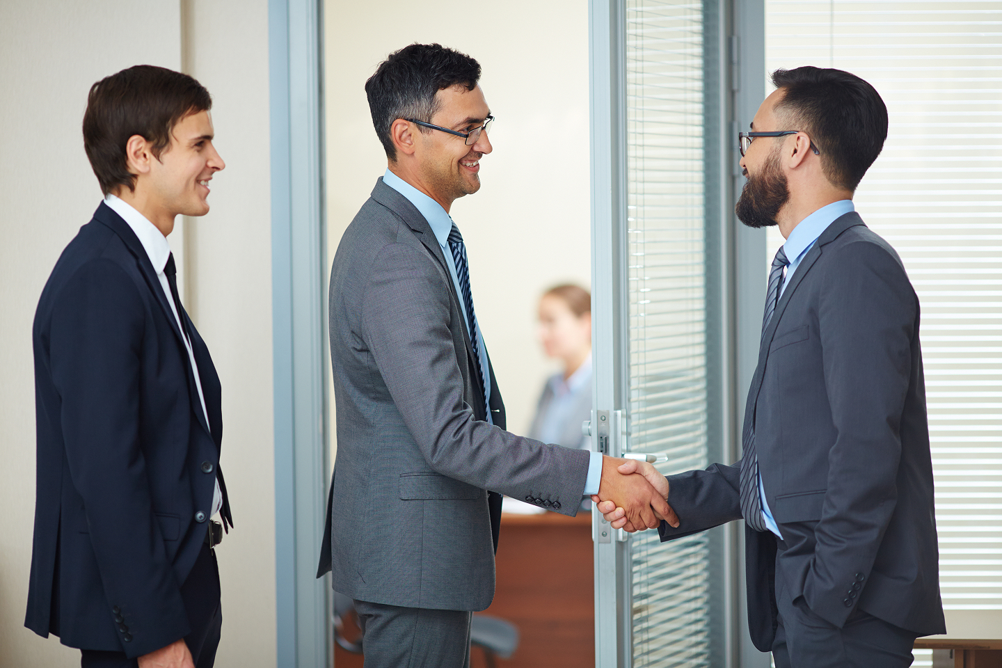 Business delegates greeting each other with a handshake