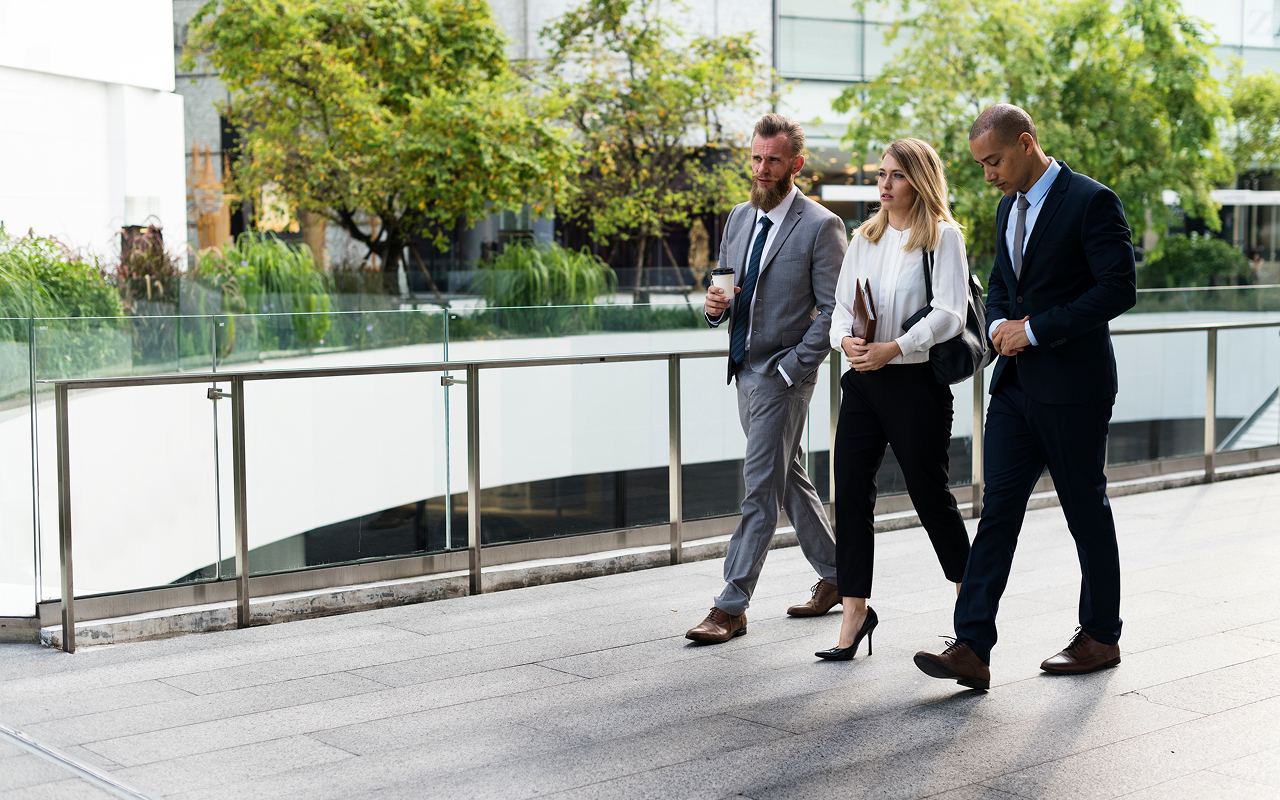 Executives walking together to their destination